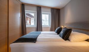 Voodi või voodid majutusasutuse Hotel Residenz Hochalm - Joker Card Partner toas +37 fotot