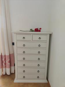 a white dresser in a room with at Pan Di Zucchero in Nebida