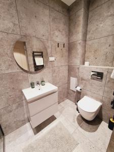 Kúpeľňa v ubytovaní Apartament D2 Karpatia - 5D Apartamenty