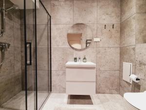 Kúpeľňa v ubytovaní Apartament D2 Karpatia - 5D Apartamenty