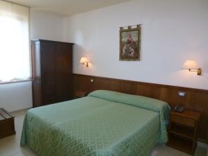 Postel nebo postele na pokoji v ubytování Casa Campiglione