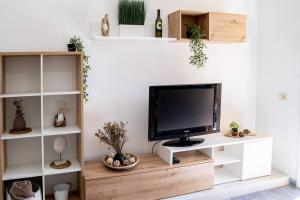Et tv og/eller underholdning på La Mar de Bello, cozy apartment!