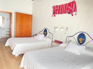 Cama o camas de una habitación en Casa Sara