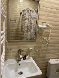 Koupelna v ubytování Glendale Boutique Hotel