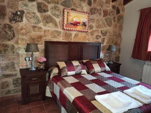 Postel nebo postele na pokoji v ubytování Casas Rurales Majana 1 + 37 fotografií