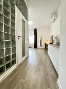 Kuchyň nebo kuchyňský kout v ubytování Self check-in apartments by Amber