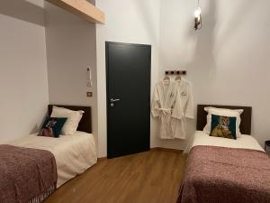 Postel nebo postele na pokoji v ubytování Gîte l'Eden à l'Est