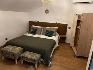 Postel nebo postele na pokoji v ubytování Gîte l'Eden à l'Est