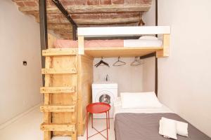 Poschodová posteľ alebo postele v izbe v ubytovaní Apartamento Tr Auriga en el Barri Vell Girona