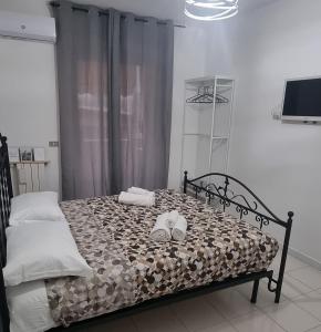 Postel nebo postele na pokoji v ubytování B&b Binario38
