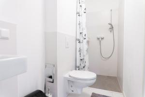 Koupelna v ubytování Hotel Triester