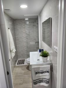 Koupelna v ubytování Estupendo apartamento al mar