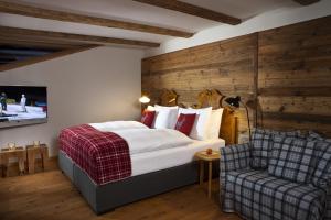 Кровать или кровати в номере Kitzhof Mountain Design Resort
