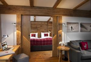Кровать или кровати в номере Kitzhof Mountain Design Resort