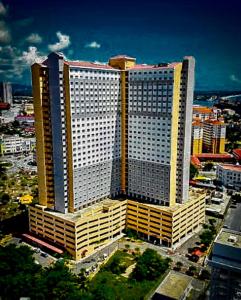 an overhead view of a large building in a city at Modern Stylish Apartment (Seaview) near KTCC Mall. in Kuala Terengganu