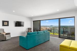 Televiisor ja/või meelelahutuskeskus majutusasutuses Blue Dun Views - Taupo