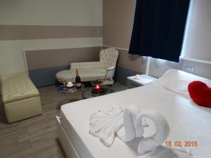 Postel nebo postele na pokoji v ubytování Hotel Moderno + 36 fotografií