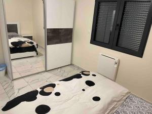 Posteľ alebo postele v izbe v ubytovaní Masion belle vue