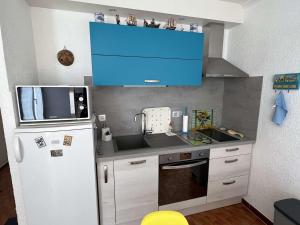 Kuchnia lub aneks kuchenny w obiekcie Charmant T2 avec terrasse, climatisation, parking - Valras-Plage - FR-1-701-6