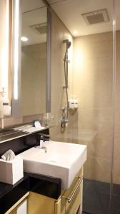 Koupelna v ubytování AI Hotel Jakarta Thamrin