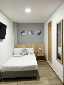 Cama o camas de una habitación en HabitacionesFC