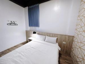 Postel nebo postele na pokoji v ubytování Starrywhale hostel