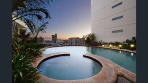 The swimming pool at or close to High Above, Pandanas Darwin 21st floor with views