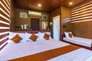 מיטה או מיטות בחדר ב-Castillo De Woods