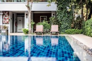 Piscina de la sau aproape de Khammon Lanna Resort Chiang Mai