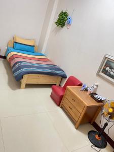 Voodi või voodid majutusasutuse Holiday Homestay toas