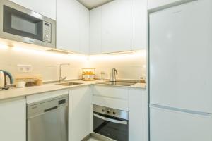 Kuchyňa alebo kuchynka v ubytovaní Osario Suite Centro Cordoba