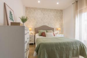 Posteľ alebo postele v izbe v ubytovaní Osario Suite Centro Cordoba
