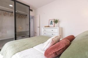 Posteľ alebo postele v izbe v ubytovaní Osario Suite Centro Cordoba