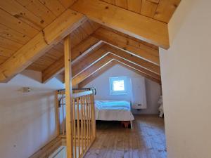 A bed or beds in a room at Chalet in Kötschach by Ski Slopes Még 24 kép