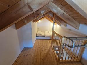 A bed or beds in a room at Chalet in Kötschach by Ski Slopes