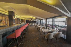 Restoran atau tempat lain untuk makan di The Alpfine Hotel