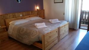 Postel nebo postele na pokoji v ubytování Albergo Bellavista + 27 fotografií