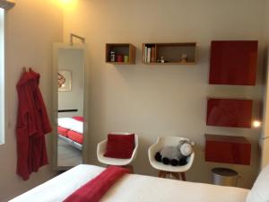Postel nebo postele na pokoji v ubytování B&B Asinello