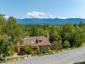 an overhead view of a house with a road at FC17 Stylishly renovated Forest Cottage walk to Bretton Woods ski trails wifi cable ping pong in Carroll