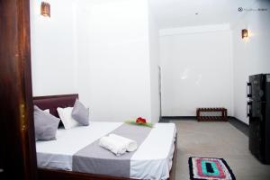 Letto o letti in una camera di Sunliya Resort
