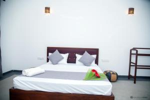 Letto o letti in una camera di Sunliya Resort