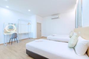 Postel nebo postele na pokoji v ubytování Poollay StayA2 Poolvilla@Pattaya พัทยา