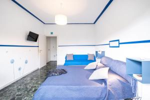 Posezení v ubytování Take It Easy Roma Guest House