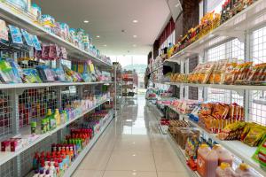 a store aisle of a grocery store filled with food at Grand Bayu Hill Hotel in Takengon