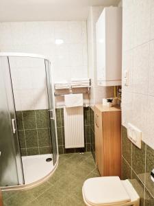 Koupelna v ubytování Apartments and Studios Perunika + 6 fotografií