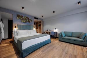 Postel nebo postele na pokoji v ubytování Barceló Budapest