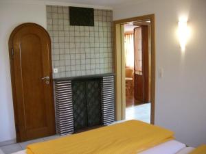Postel nebo postele na pokoji v ubytování Gästehaus Seeblick