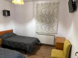 Posteľ alebo postele v izbe v ubytovaní El Balcón de la Covatilla