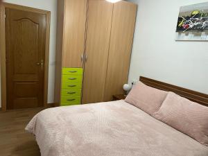 Posteľ alebo postele v izbe v ubytovaní El Balcón de la Covatilla
