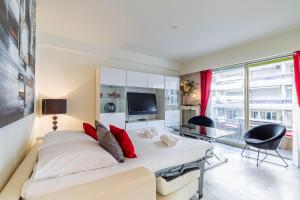 Posteľ alebo postele v izbe v ubytovaní Cozy studio in the heart of Cannes - Near sea